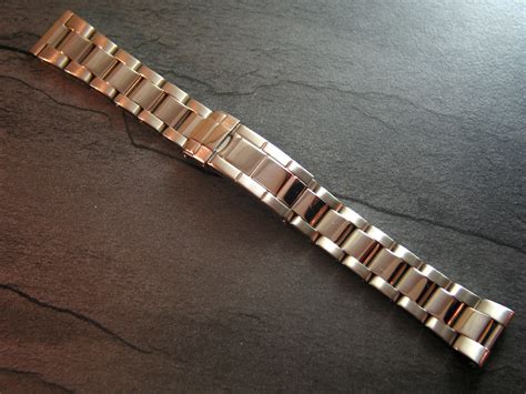 rolex oyster style bracelet.